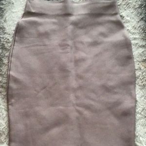 Beige skirt.